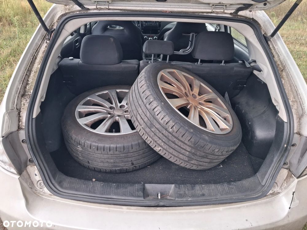 Subaru Impreza 2.0D Exclusive - 12