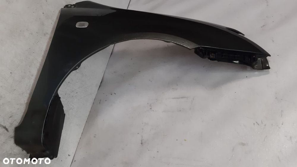* TOYOTA COROLLA E12  BŁOTNIK PRZÓD PRAWY 1G3 - 3