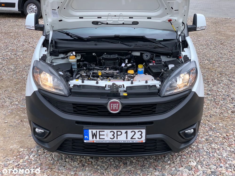Fiat DOBLO PROFESSIONAL L2H1 Long MAXI VAN WZMOCNIONY Ładowność 961kg, Homologacja cięż. VAT-1, HAK wpinany 1300kg, Alarm, Czujniki parkowania, Halogeny, Podgrzewane fotele, Koła 16' MOCNY SILNIK 1.6 MultiJet, 105KM Emisja spalin Euro-6, Skrzynia biegów 6cio stopniowa! Zabudowa paki, F-VAT23% - 24