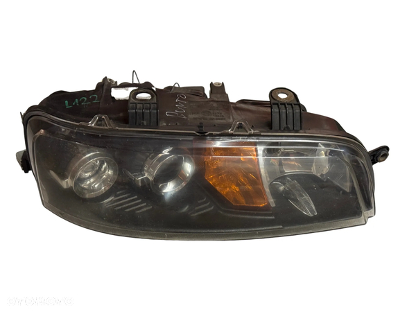 LAMPA REFLEKTOR GŁÓWNY PRAWY FIAT PUNTO II PRZEDLIFT CIEMNY ŚRODEK