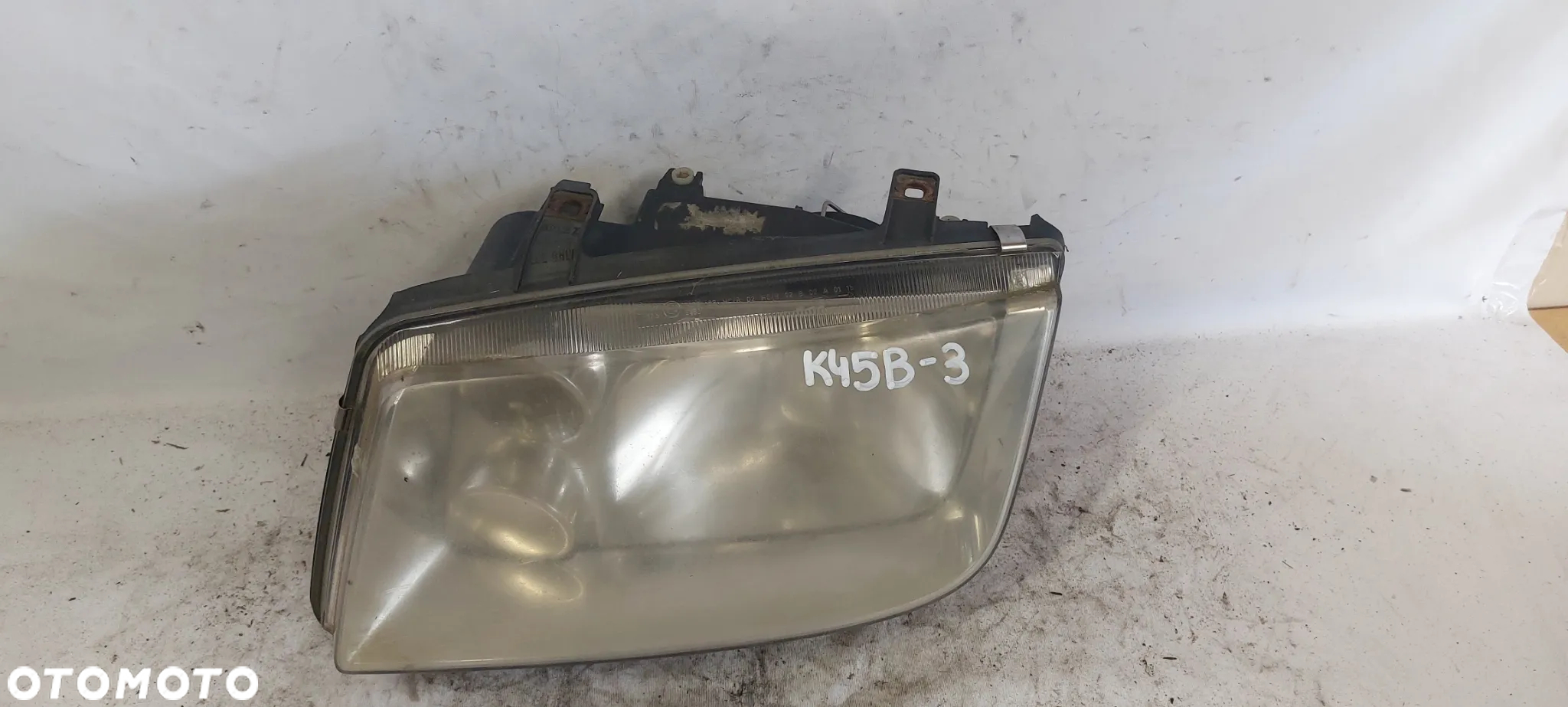 .  PRZOD PRZEDNIA LAMPA LEWA VOLKSWAGEN BORA - 2