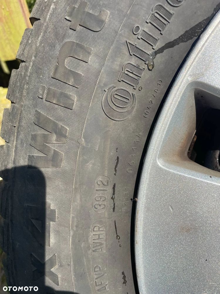 Koła zimowe z kołpakami FORD KUGA 235/60 R16 5x108 - 7