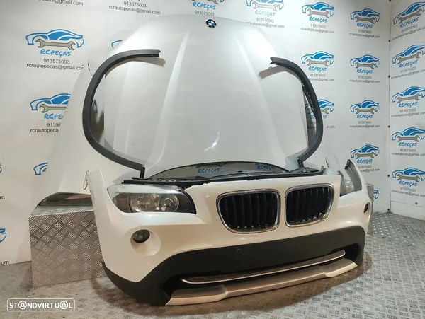 Frente Completa BMW X1 E84 - 2009 a 2015 - Parachoques | Guarda Lamas | Capot | Grelhas | Radiadores | Reforço | Fibra | Oticas | Sensores Estacionamento | Ventilador | S X Drive | Parachoque | Lama | Otica