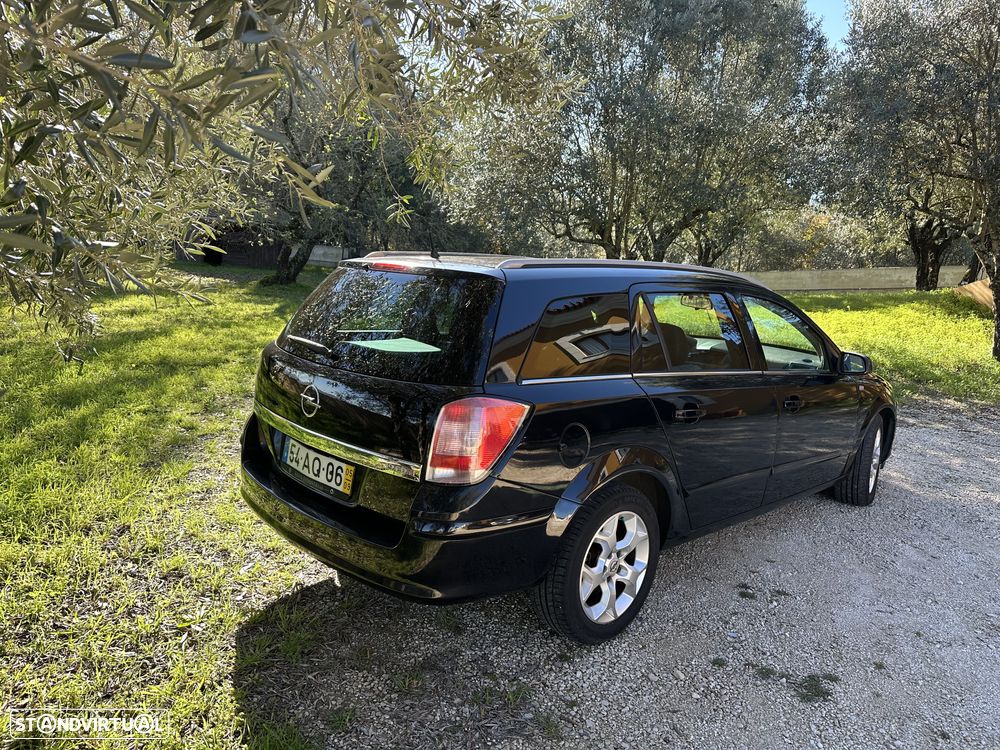 Opel Astra Caravan 1.9 CDTI Cosmo - 1