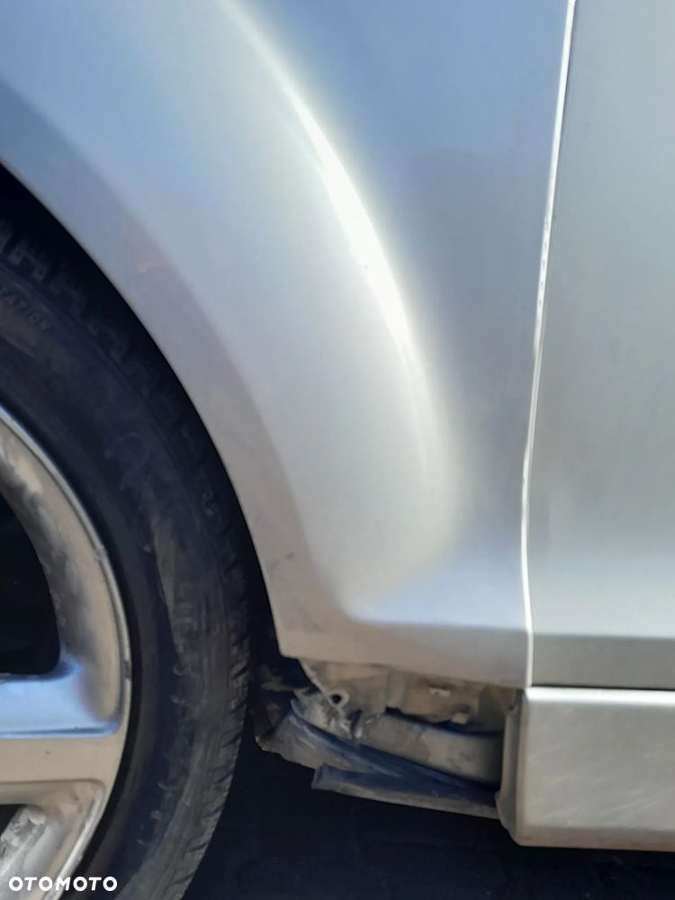 Błotnik przedni lewy AUDI Q7 4L 05-09r. LX7W - 4