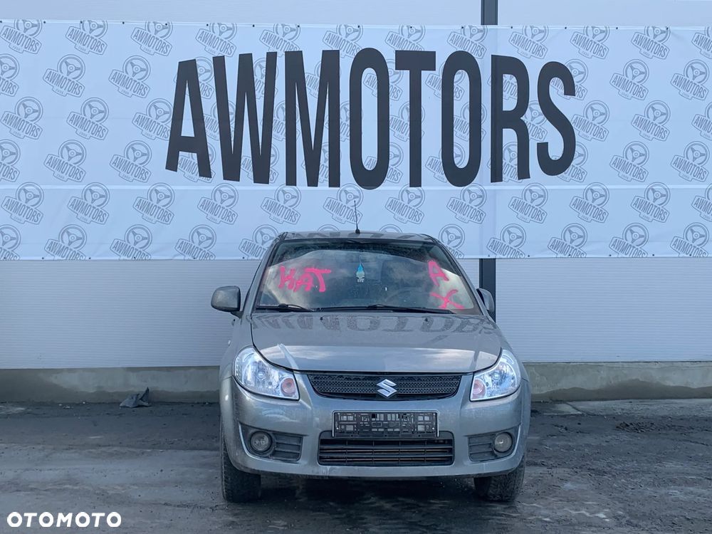 SUZUKI SX4 2006 *SAMOCHÓD NA CZĘŚCI* 3779  MASKA, LAMPA, DRZWI, LUSTERKO, ZDERZAK, GRILL, BŁOTNIK, KLAPA, BELKA, DESKA, FOTELE, KANAPA, ĆWIARTKA KIEROWNICA, TARCZE, ZACISKI, ZAWIESZENIE, KOMPLETNY PRZÓD, KOMPLETNY TYŁ, LICZNIK, ZEGARY, PRAWE LEWE PRZÓD TYŁ - 2