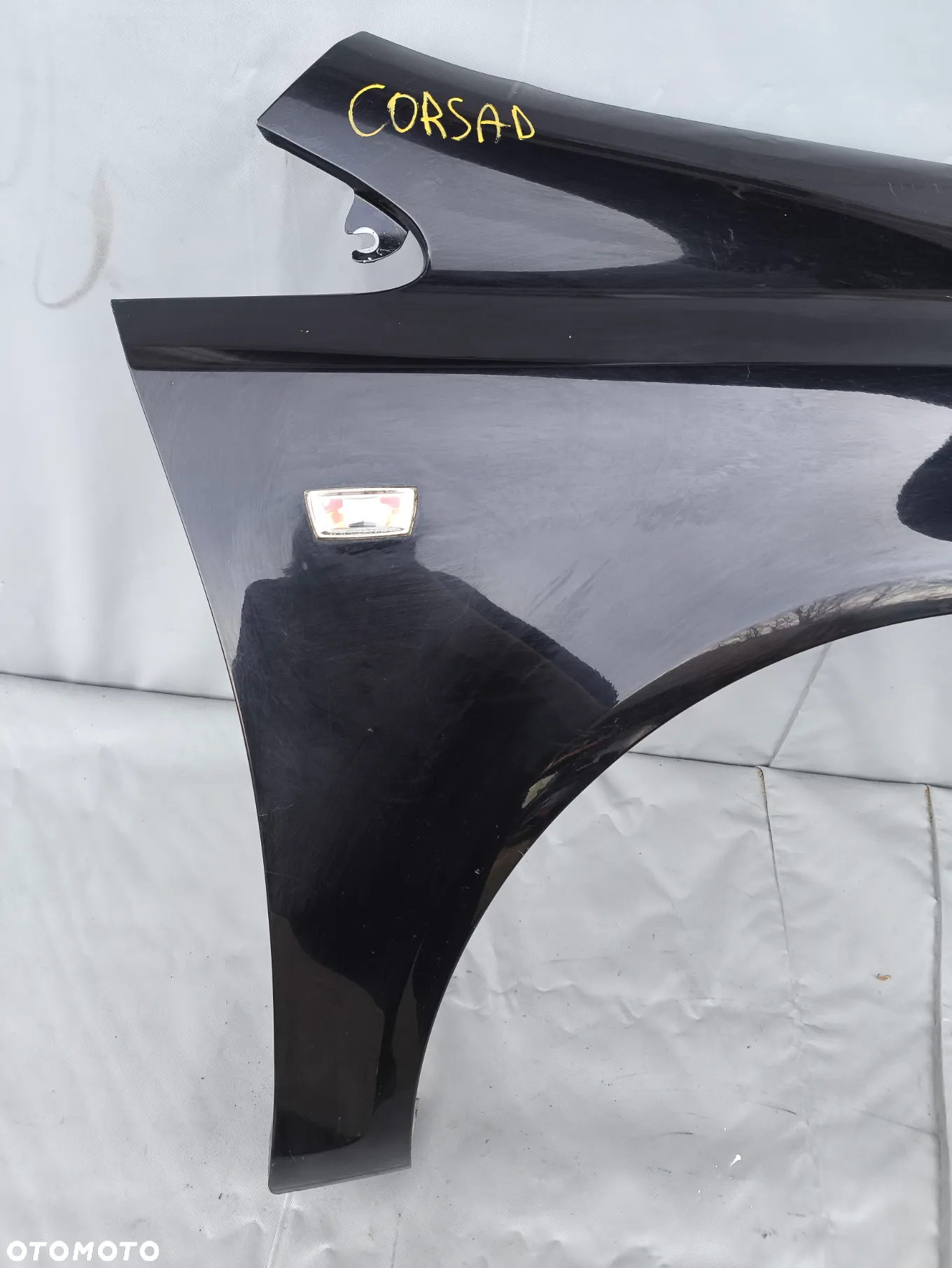 OPEL CORSA D BŁOTNIK PRZEDNI PRAWY - 2