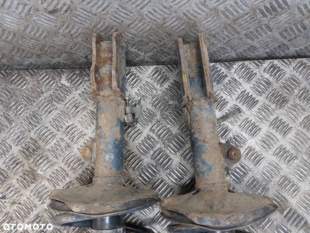 AMORTYZATOR + SPRĘŻYNA LEWY PRZÓD + PRAWY PRZÓD COROLLA E12 1.4 16V - 4