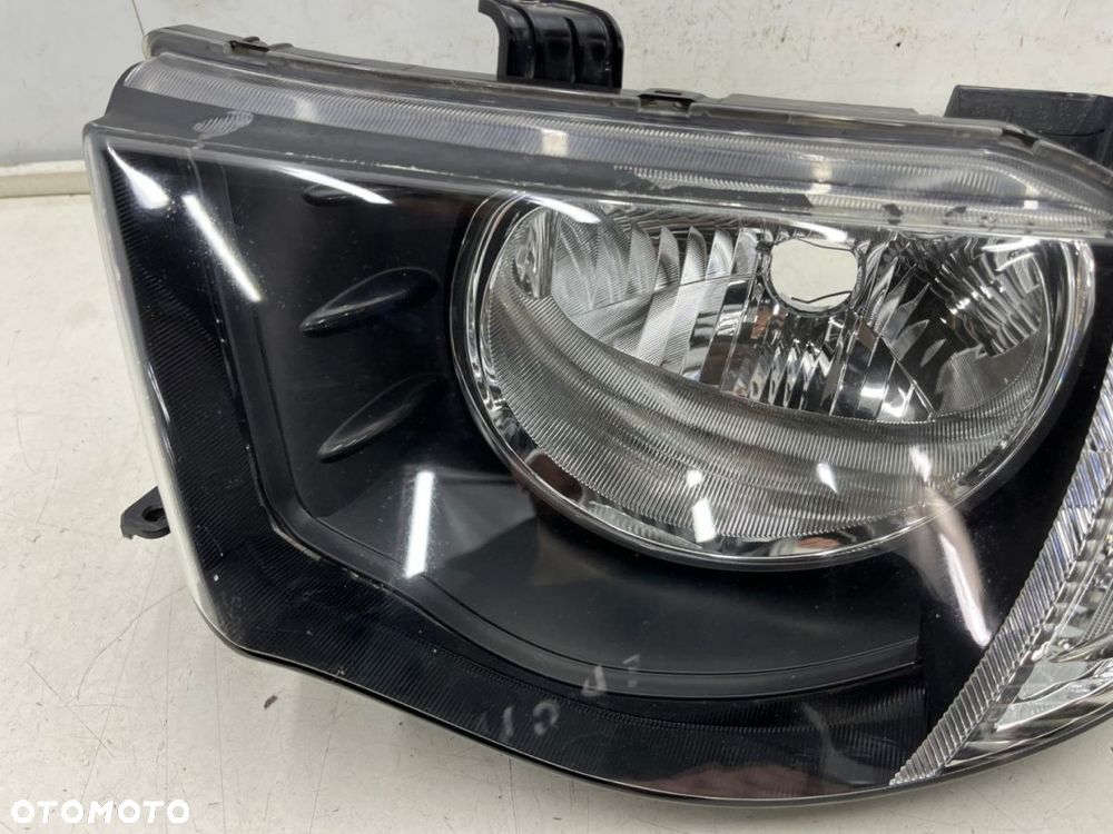 Lampa reflektor Mitsubishi L200 KA KB 05-10r. LEWA przednia H4 oryginalna lewy przód EU 8301b461 - 4