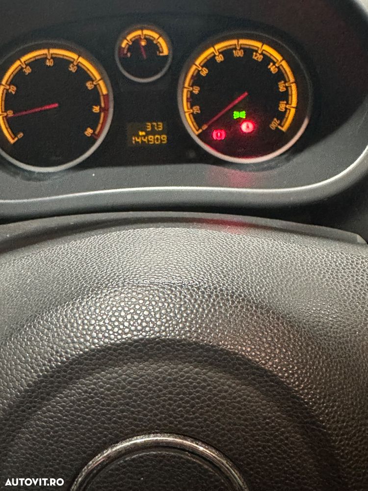 Opel Corsa 1.2i Cosmo - 12