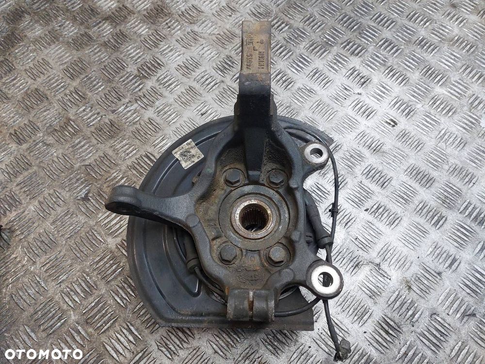 PIASTA ZWROTNICA LEWY PRZÓD + CZUJNIK ABS NISSAN PULSAR C13 1.5 DCI - 2