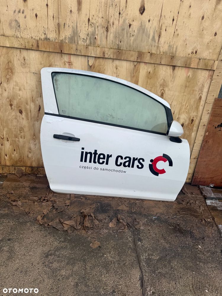 Opel Corsa D biała maska drzwi prawe lewe przednie przód pas przedni chłodnice wody klimy lampy lampa przednia prawa lewa błotnik prawy lewy biały białe zderzak przód przedni klapa bagażnika klapa tył tylnia lampa prawa lewa belka pod zderzak - 12