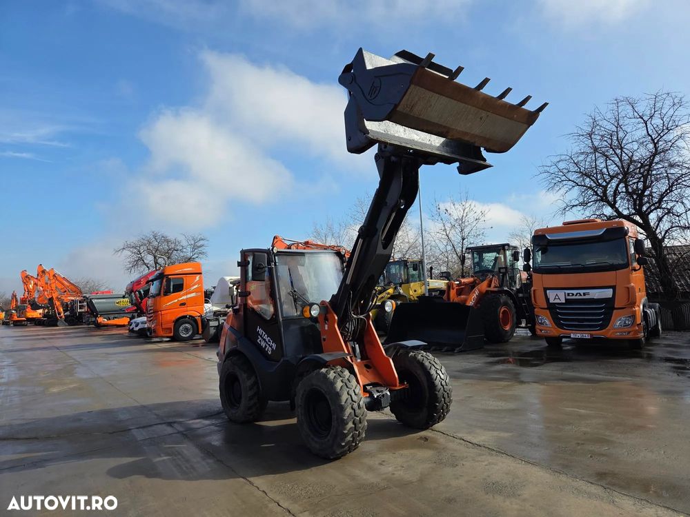 Hitachi ZW75, 2020, 1.915h, ridica 2,4t la 3,2m, CUPA 4x1 MULTIFUNTIONALA 1mc, cupa noua 1mc, furci, cupla rapida, aer conditiona, motor Deutz 75CP euro 6, Garda sol inalta 32cm, produs in Germania, STARE FOARTE BUNA, posibil leasing 4 ani-PROMOTIE 37.900eur - 33
