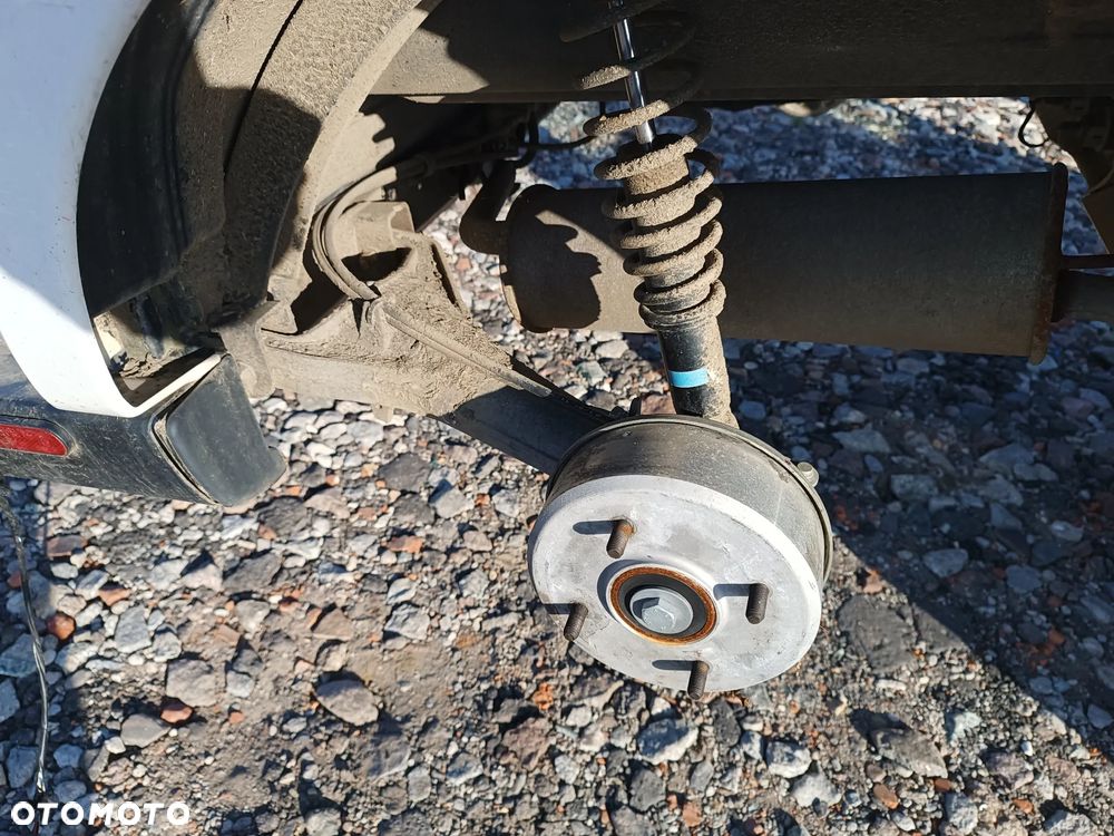 WAHACZ LEWY TYŁ PIASTA AMORTYZATOR AIXAM MINAUTO - 1