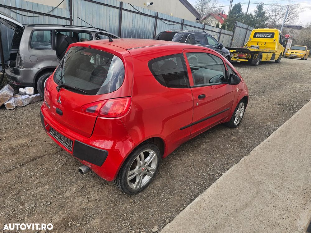 Dezmembrez Mitsubishi Colt CZ3 1.1 benzina an 2006 volan stanga - 6
