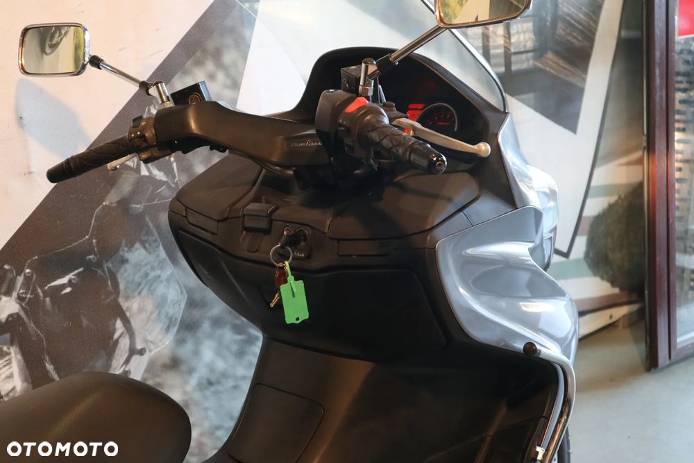 Suzuki Burgman - 16