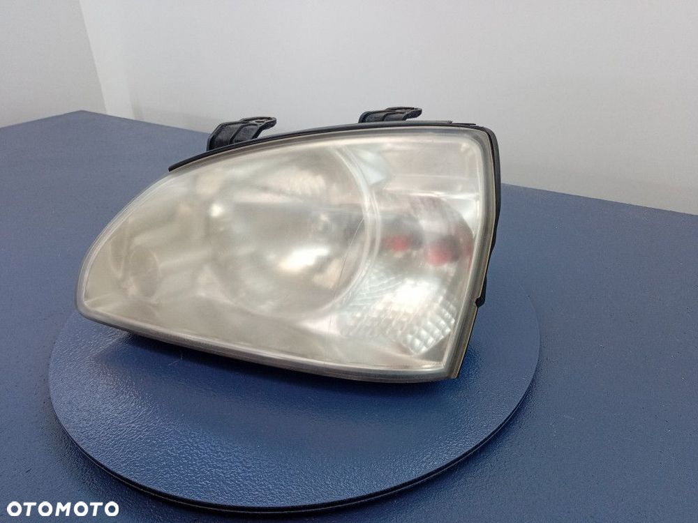 KIA CARENS II REFLEKTOR LEWY PRZÓD EU 0K2FA-51020 - 2