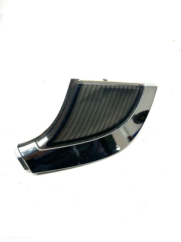 Saab 95 95 lewy odblask reflektora kierunkowskaz chrom 2006-2009 lampy dekor 89101420