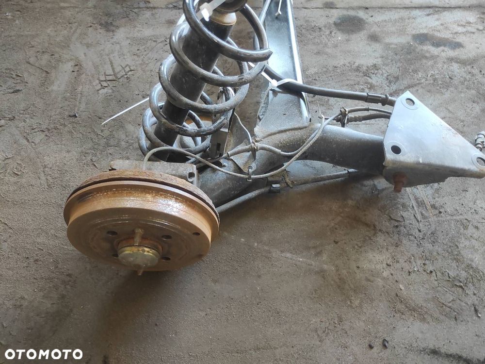 BELKA OŚ ZAWIESZENIA TYŁ BĘBNY Z ABS FIAT PANDA II ID: 239020 - 2
