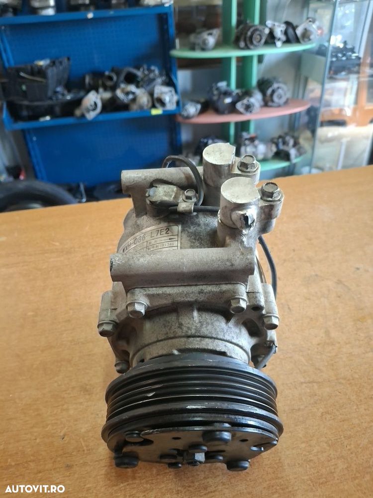 Compresor aer condiționat ÐR4 1.6 Benzina  84Kw - 7