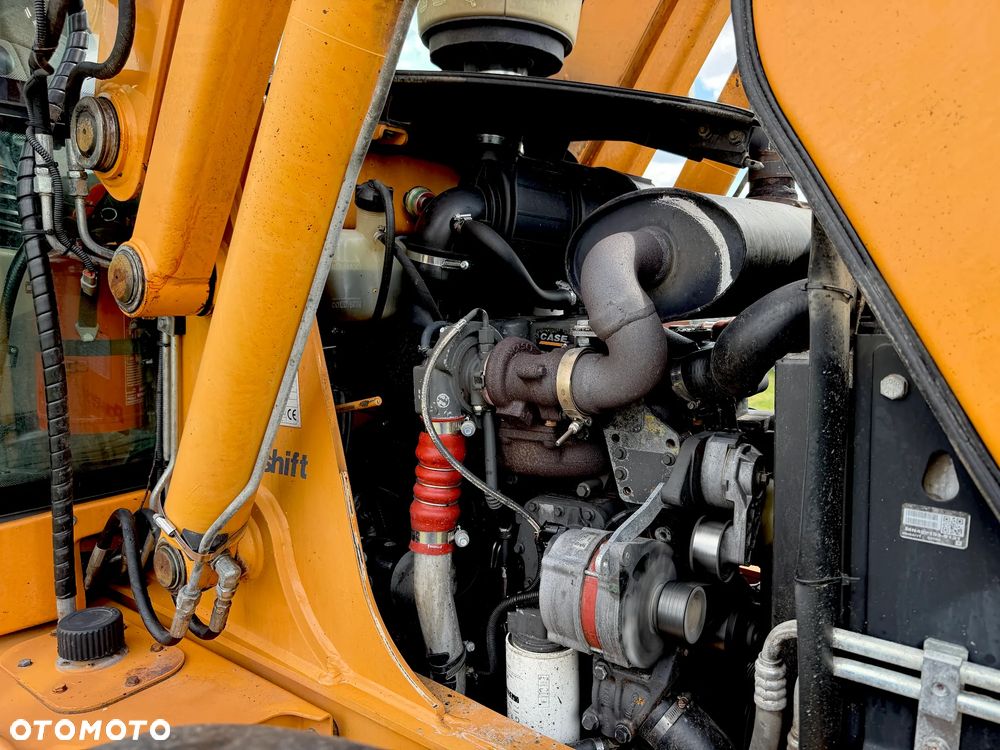 Case 695ST - 4