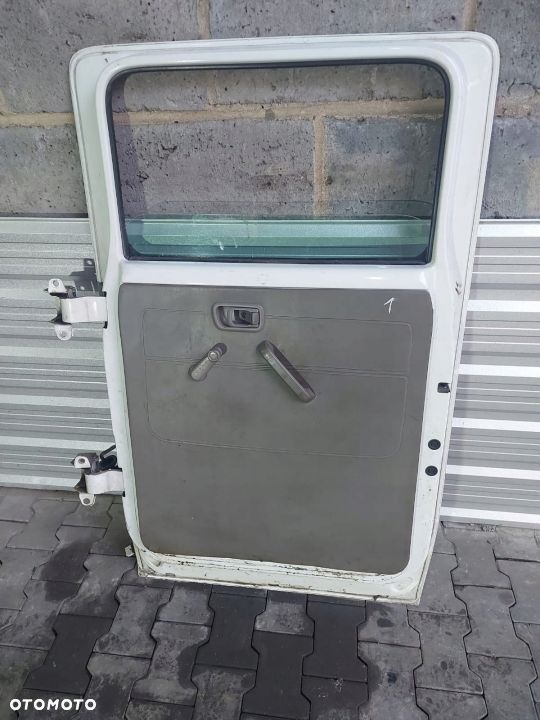 Drzwi prawe dubel kabina Maxity Cabstar - 2