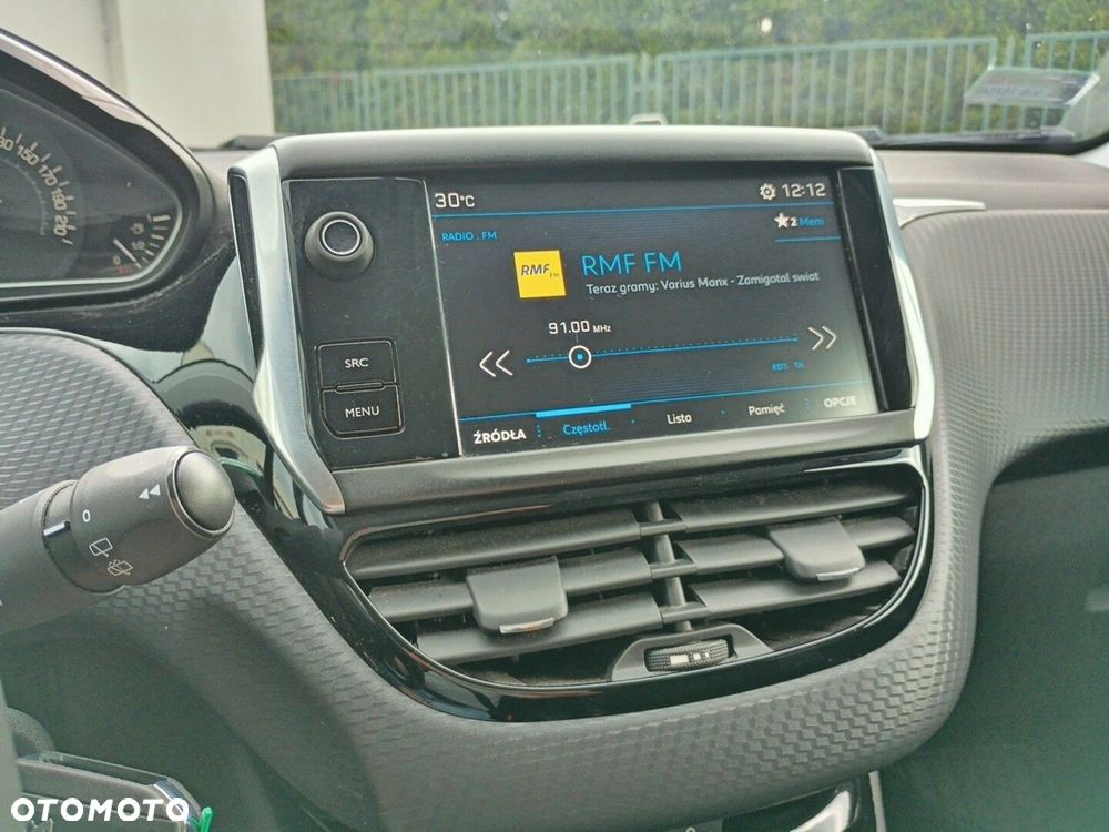 Peugeot 208 1.2 PureTech Style - 23