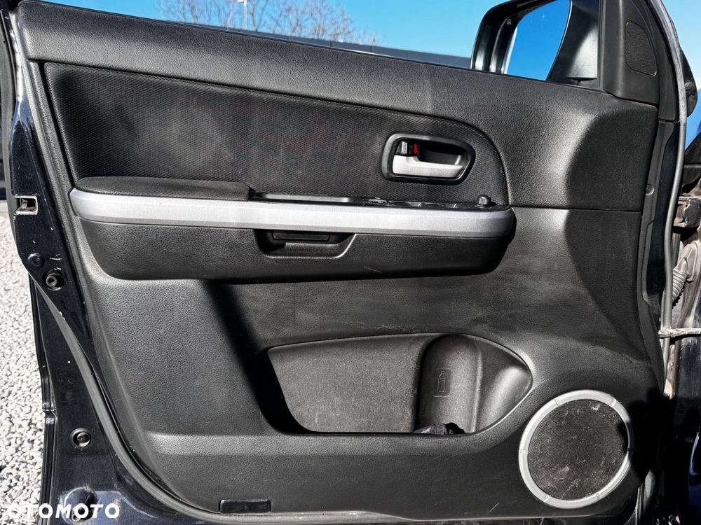 Suzuki Grand Vitara 2.0 Comfort + - 14