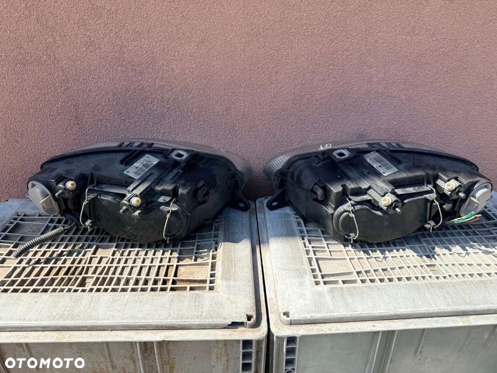 Lampa przednia ALFA ROMEO GT ZWYKŁE KOMPLET EUROPA ORYGINALNE AL - 4