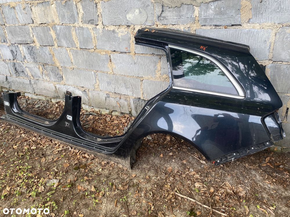 Opel Insignia kombi błotnik tył lewy - 1