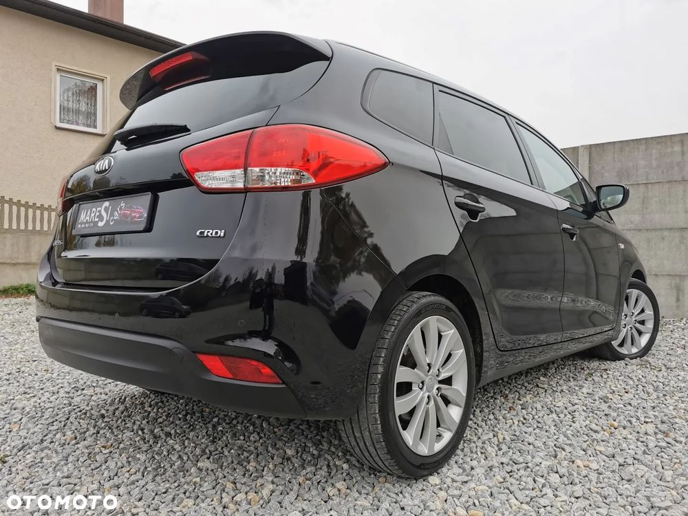 Kia Carens - 34