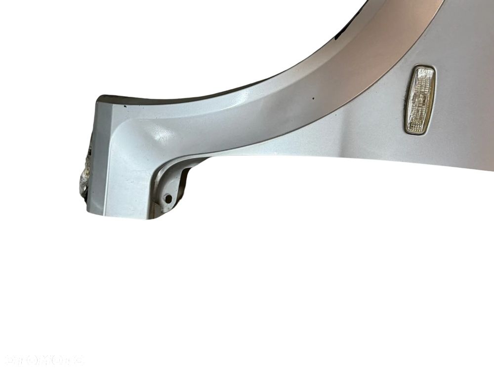 BŁOTNIK LEWY TATA INDICA SREBRNY ORYGINAŁ - 4