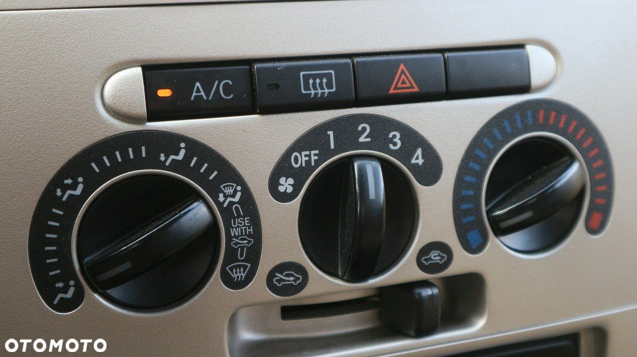 Daihatsu Cuore 1.0 Top - 11
