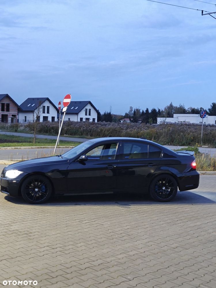BMW E90 2006 photo 2