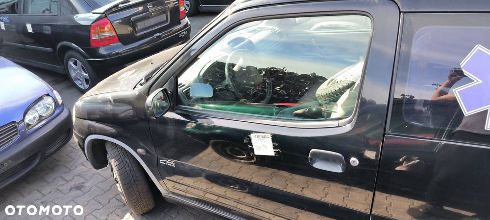 DRZWI LEWE PRZÓD SUZUKI IGNIS 2001 - 1