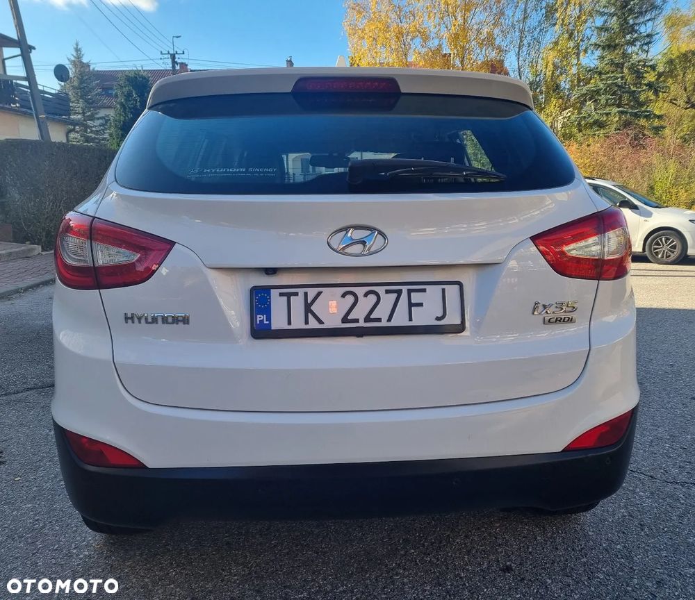 Hyundai ix35 1.7 CRDi 2WD blue Finale Gold - 14