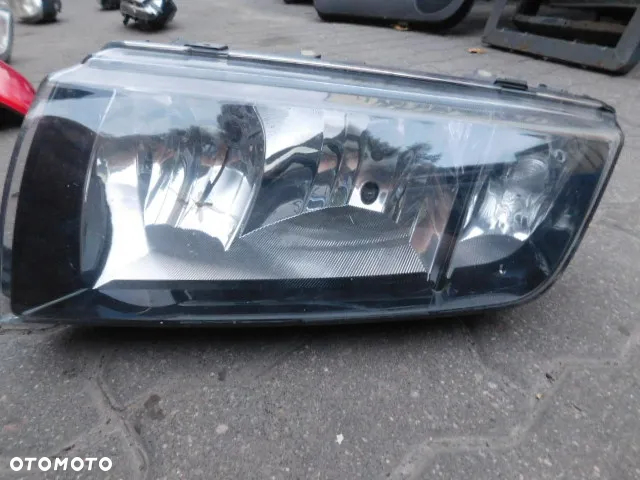 lampa lewa przód SKODA FABIA I lift black Europa - 2