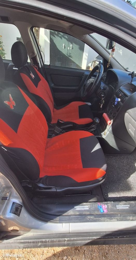 Opel Astra Caravan ver-caravan-1-9-cdti-enjoy-auto - 7