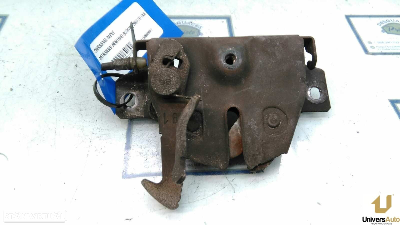 FECHADURA CAPÔ MITSUBISHI PAJERO 1999 -MB669561 - 2