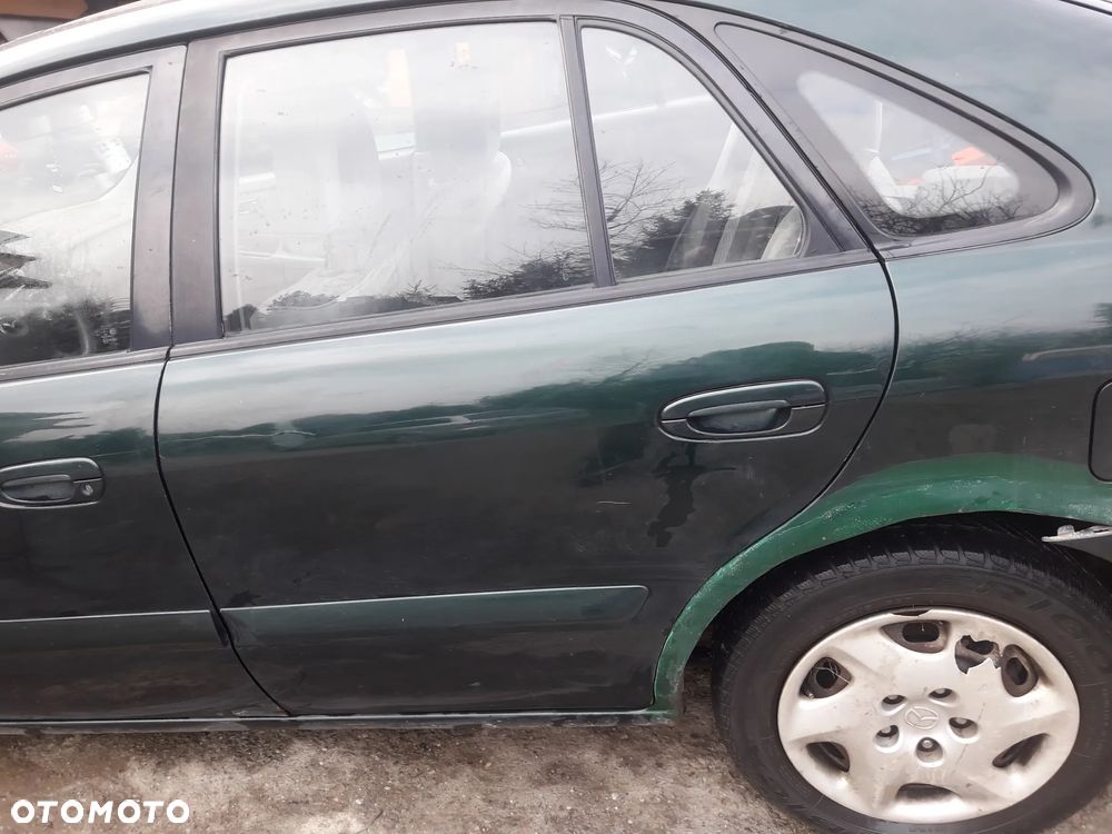 Mazda 626 GF 97-02 HB Drzwi lewe tylne tył  Lewy 18J