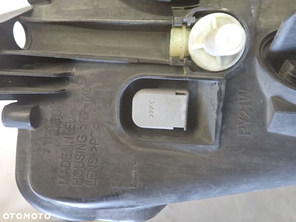 LAMPA LEWA PRZEDNIA OPEL MERIVA A 1.2 93321052 - 9