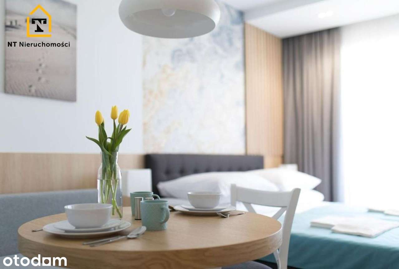 Wyposażony apartament z balkonem.