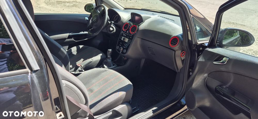 Opel Corsa 1.4 16V Cosmo - 11