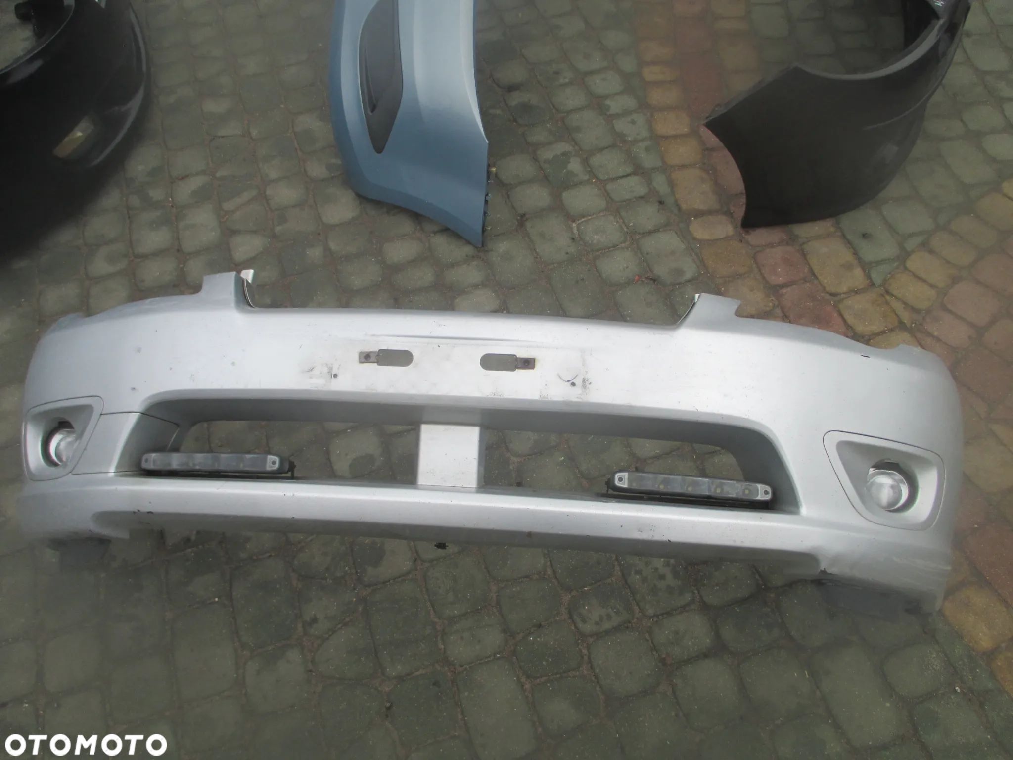 Zderzak przód Subaru Legacy IV 03-06 57704AG000 - 1