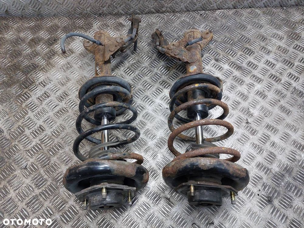 AMORTYZATOR + SPRĘŻYNA LEWY PRZÓD + PRAWY PRZÓD NISSAN PRIMERA P12 1.8 16V - 1