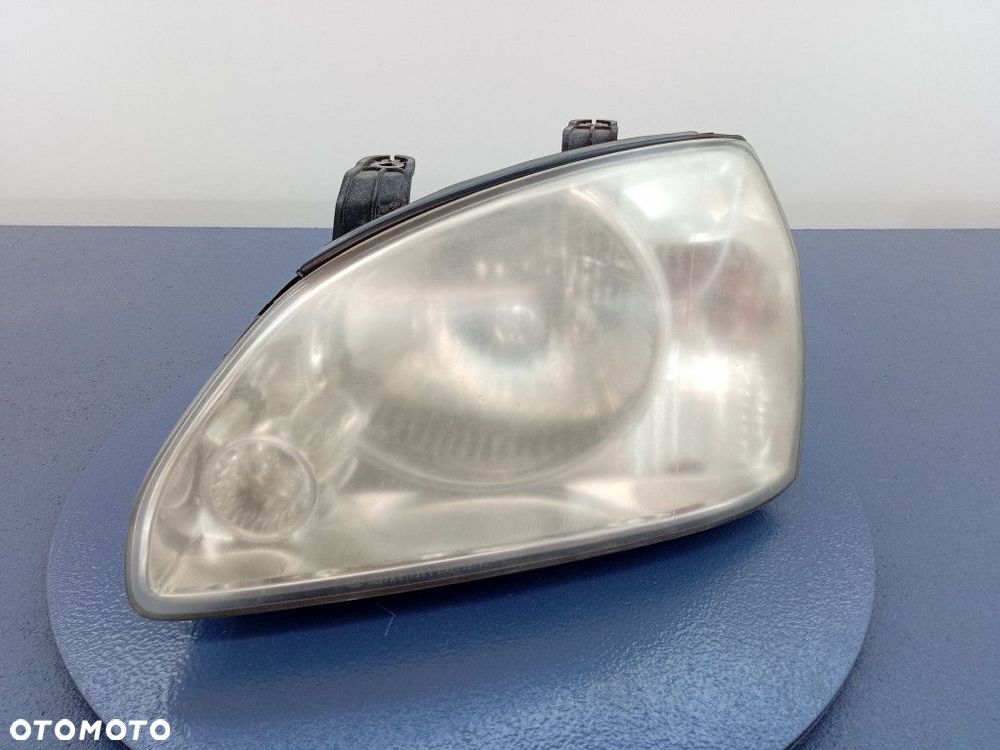 KIA CARENS II REFLEKTOR LEWY PRZÓD EU 0K2FA-51020 - 1