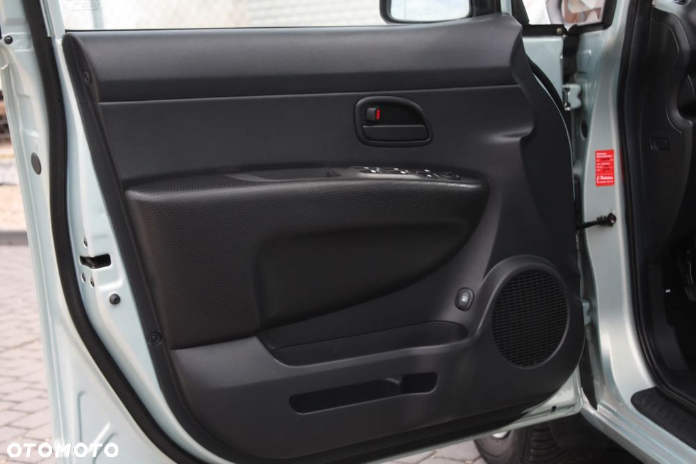 Kia Carens 2.0 CVVT LX - 9