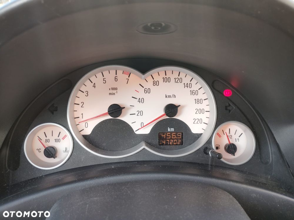 Opel Corsa 1.2 16V Enjoy - 8