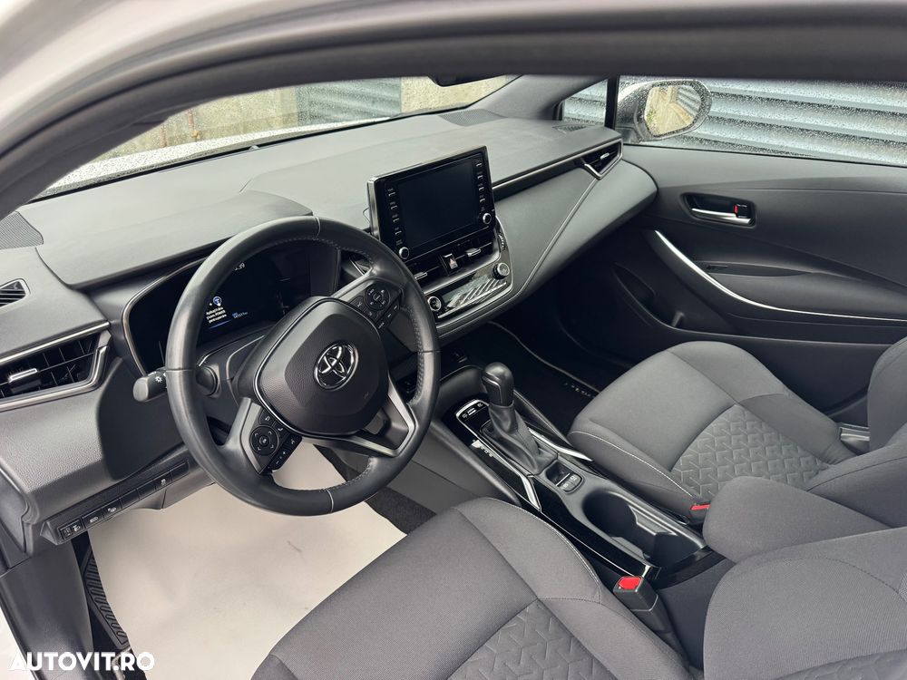 Toyota Corolla 1.8 HSD Business - 14