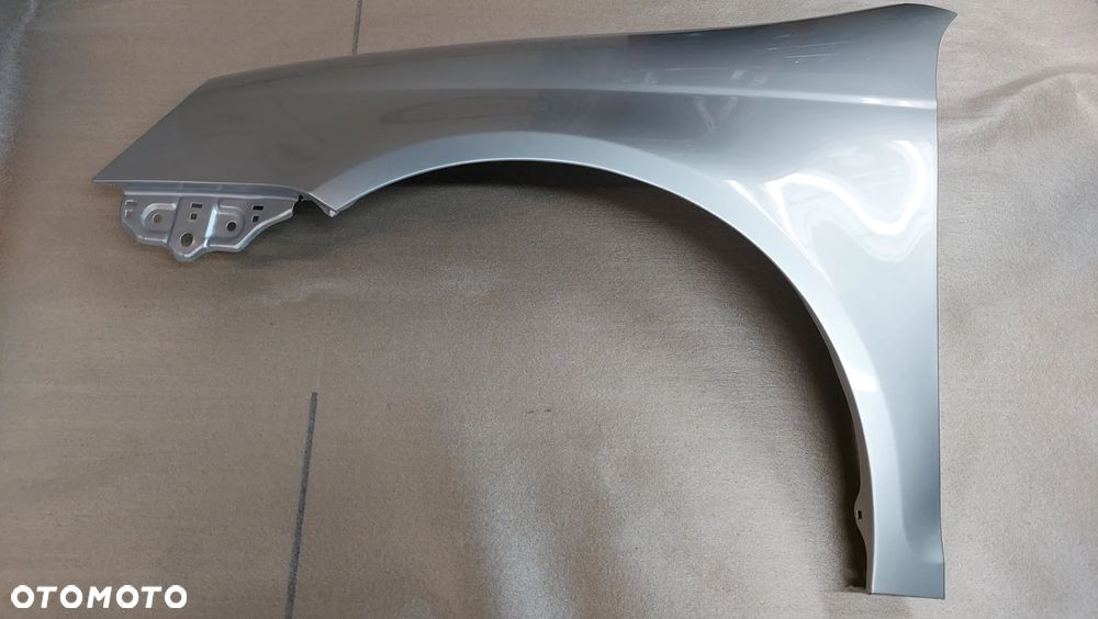 VW GOLF V 5 03-09rok KOMBI BŁOTNIK LEWY LUB PRAWY  LA7W CYNK. - 1